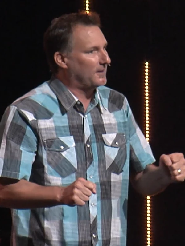 Mike Millett, OB1, speaking on stage
